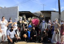 Barracão de reciclagem se transforma em passarela para desfile de moda sustentável